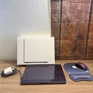 Purple Laptop with Accessories